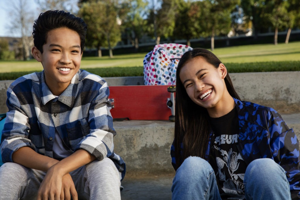 teens smiling at the park